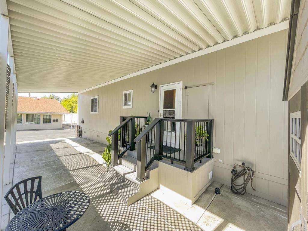 8545 Mission Gorge Road, Unit SPC 211 Santee, CA 92071 - Photo 5 of 33 a view of a porch with seating space