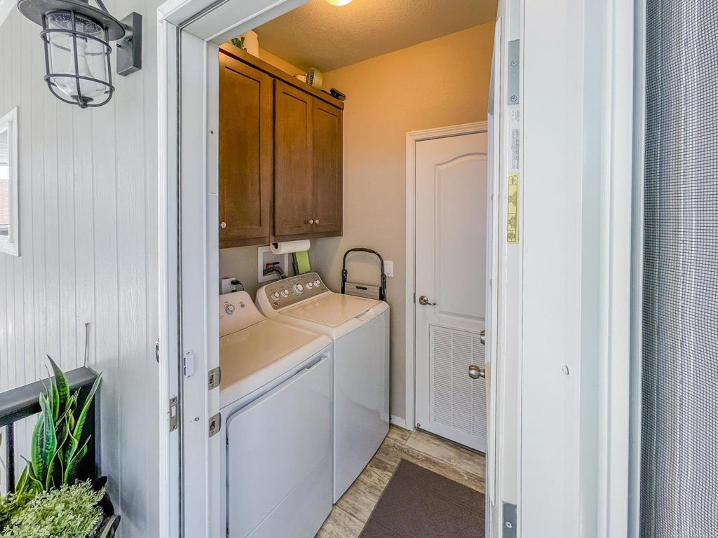 8545 Mission Gorge Road, Unit SPC 211 Santee, CA 92071 - Photo 7 of 33 a bathroom with a sink and mirror