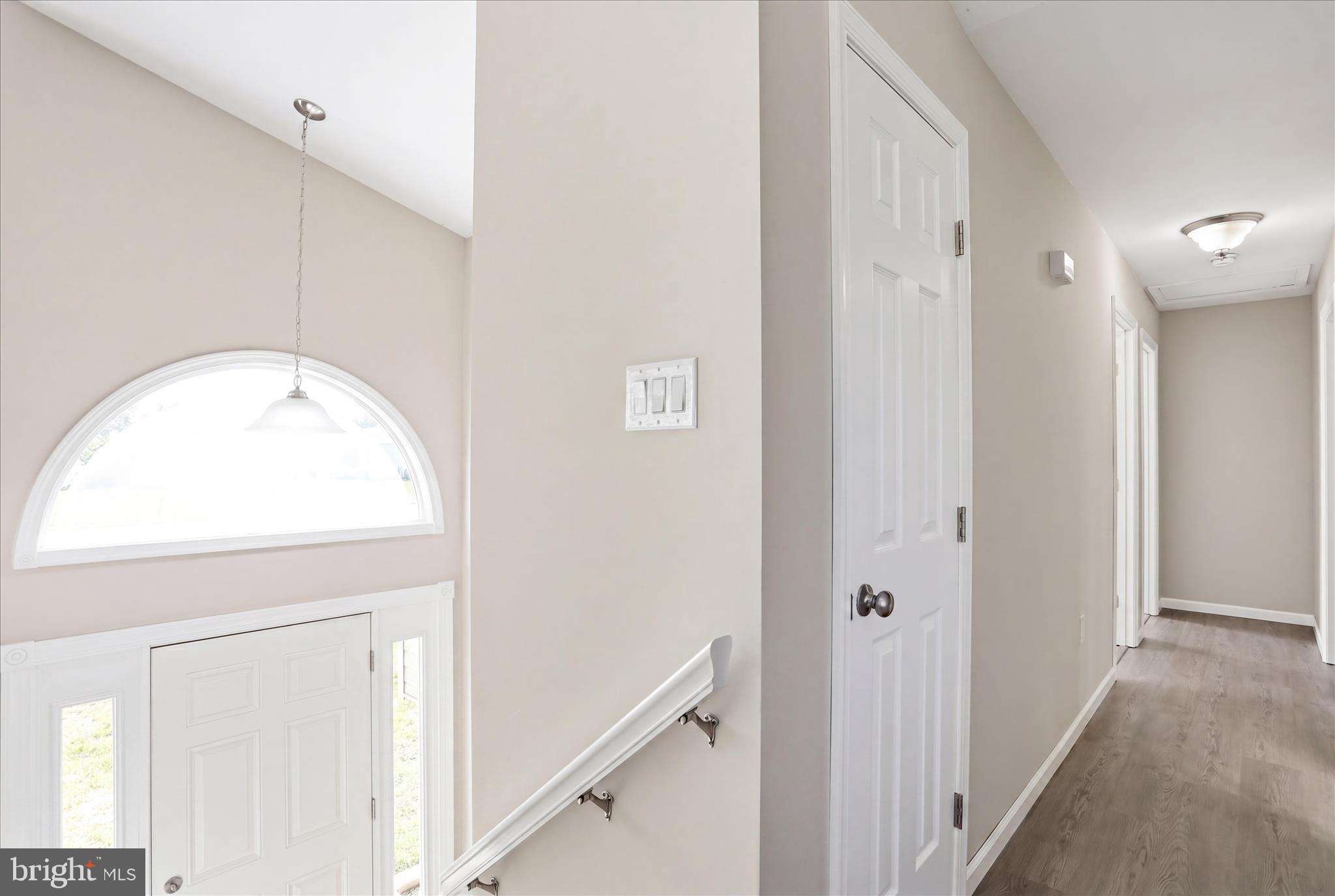 174 Open Field Lane Falling Waters, WV 25419 - Photo 7 of 56 Upper level hall/ open foyer