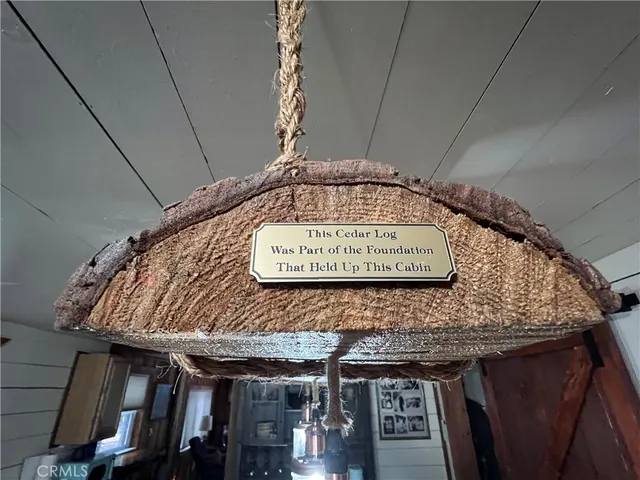 a sign on a wooden wall