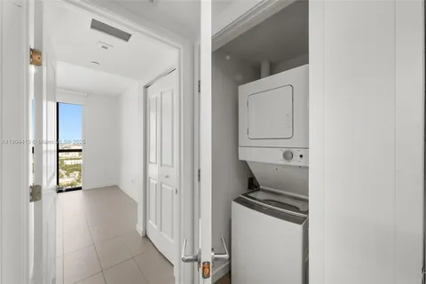 a view of a kitchen from the hallway
