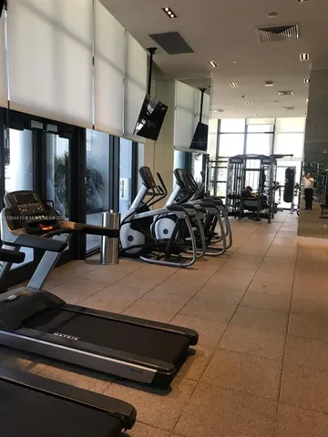 a view of a room with gym equipment