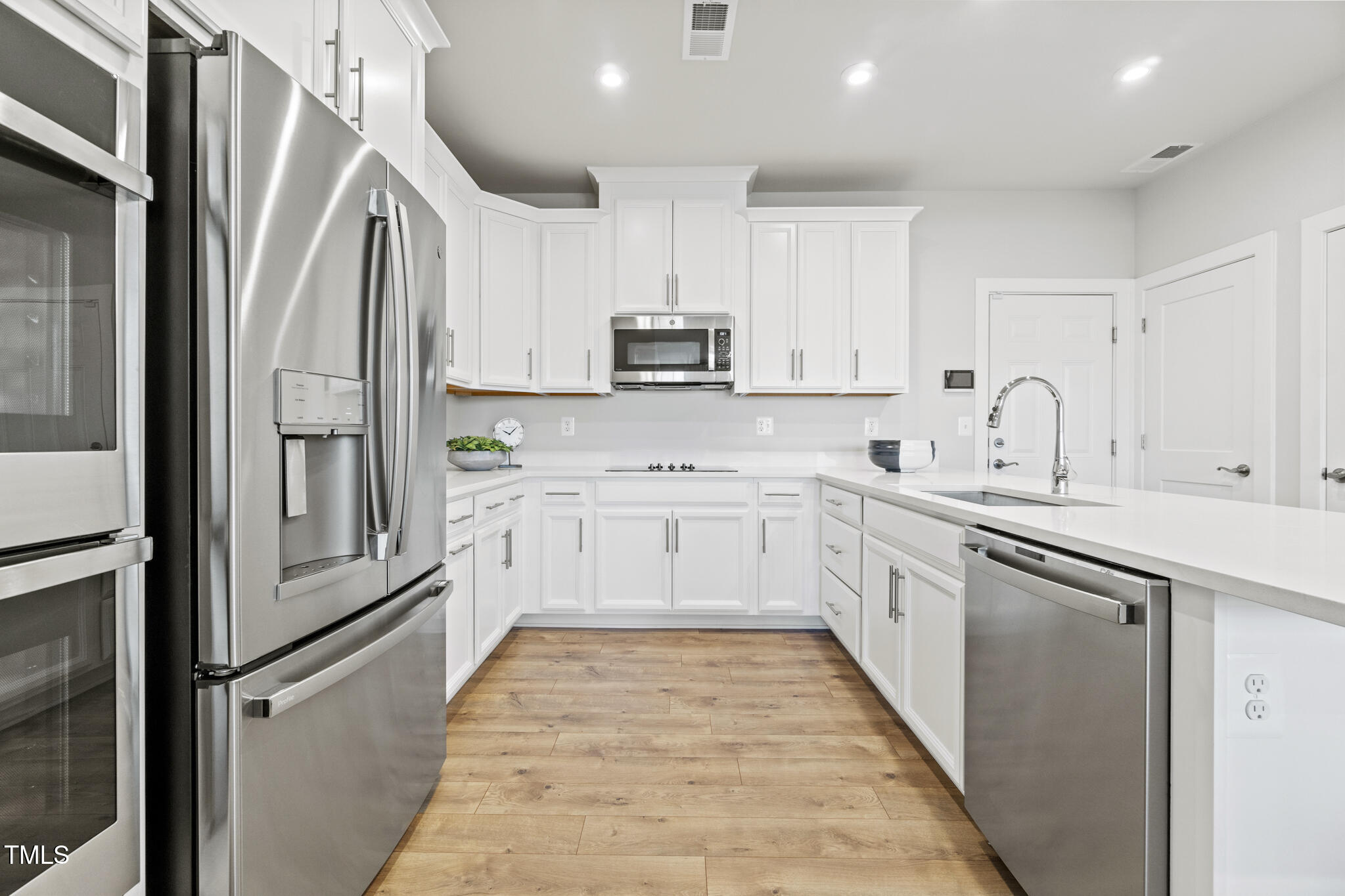600 Hedrick Ridge Road, Unit 104 Cary, NC 27519 - Photo 9 of 35 NVA_VMP_Tessa_Model_ Kitchen