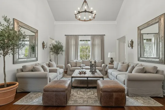 a living room with furniture or couch and a large window