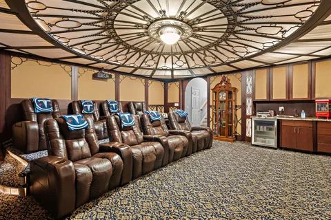 a living room with lots of furniture and white walls