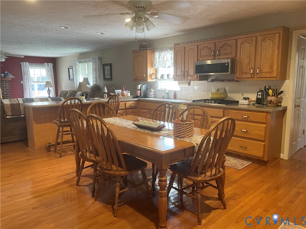 8002 Vaughan Road Petersburg, VA 23805 - Photo 2 of 28 a view of a dining room with furniture