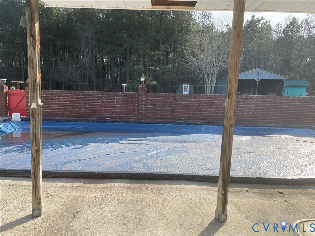 8002 Vaughan Road Petersburg, VA 23805 - Photo 22 of 28 a view of a porch