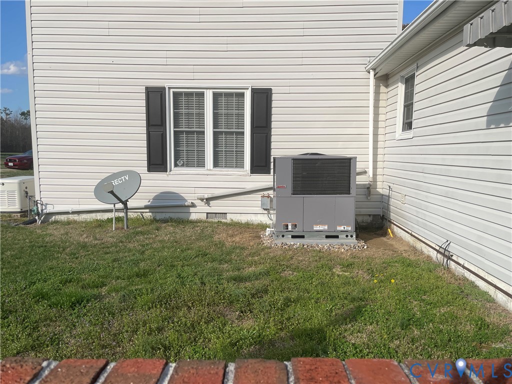 8002 Vaughan Road Petersburg, VA 23805 - Photo 27 of 28 a front view of a house with patio
