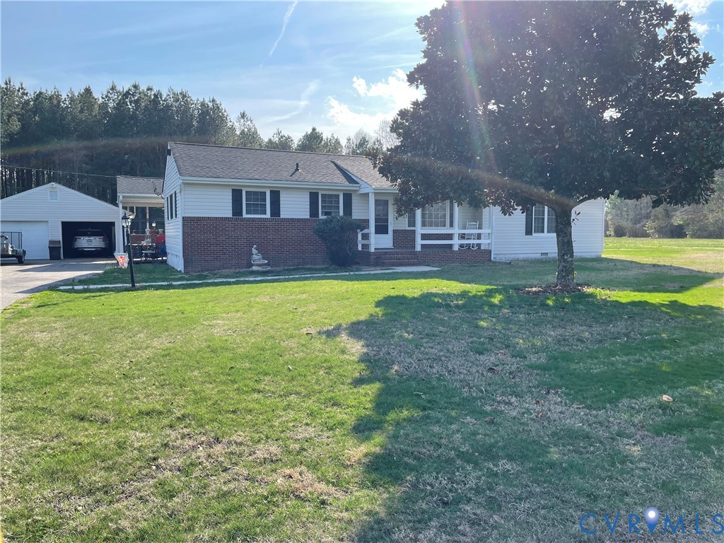 8002 Vaughan Road Petersburg, VA 23805 - Photo 28 of 28 a front view of a house with swimming pool having outdoor seating