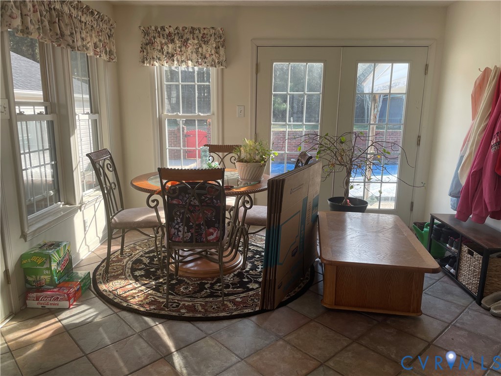 8002 Vaughan Road Petersburg, VA 23805 - Photo 10 of 28 a view of a dining room with furniture window and outside view