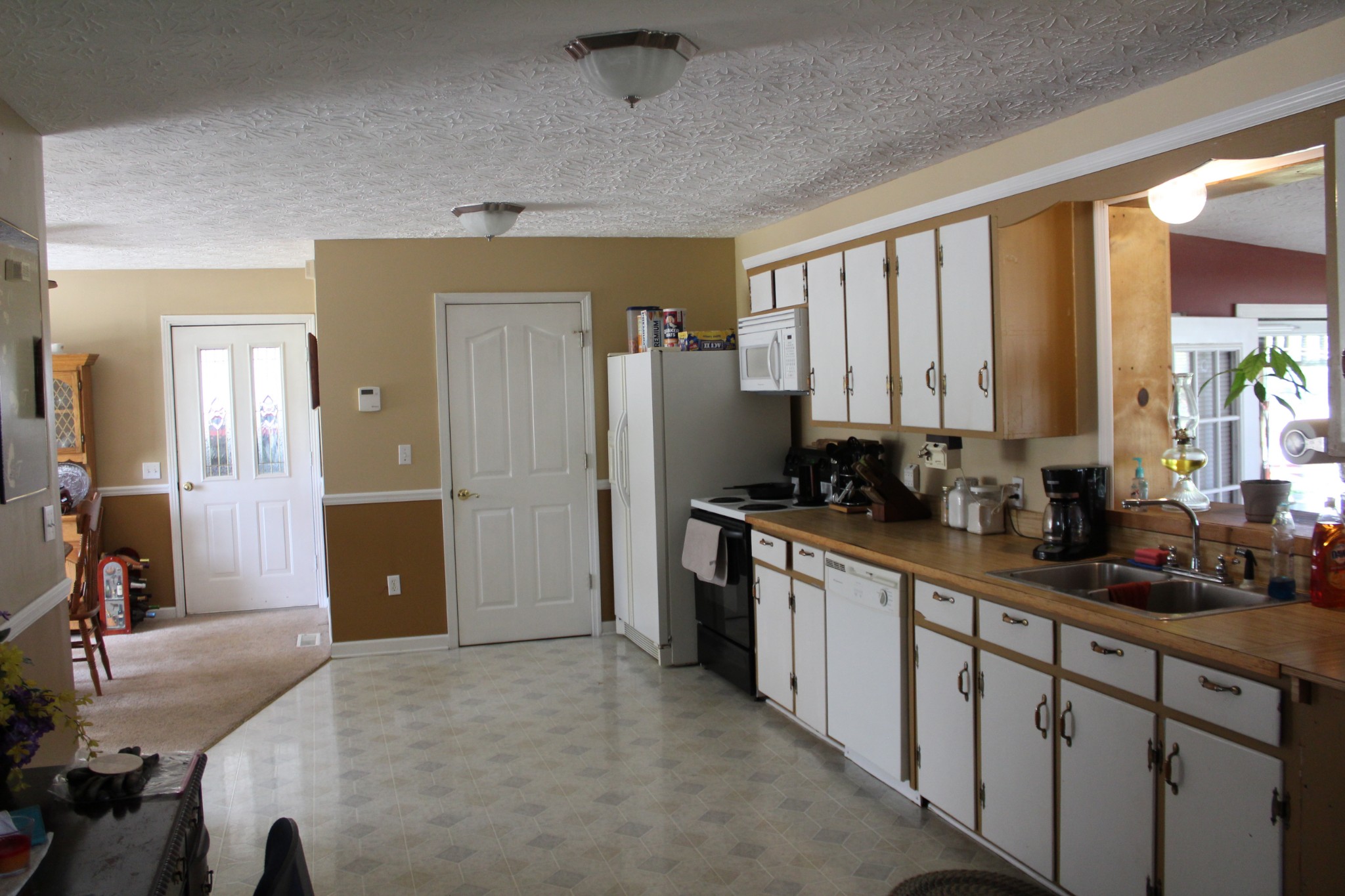 3847 Shellsford Road McMinnville, TN 37110 - Photo 13 of 34 a large kitchen with a large window and stainless steel appliances