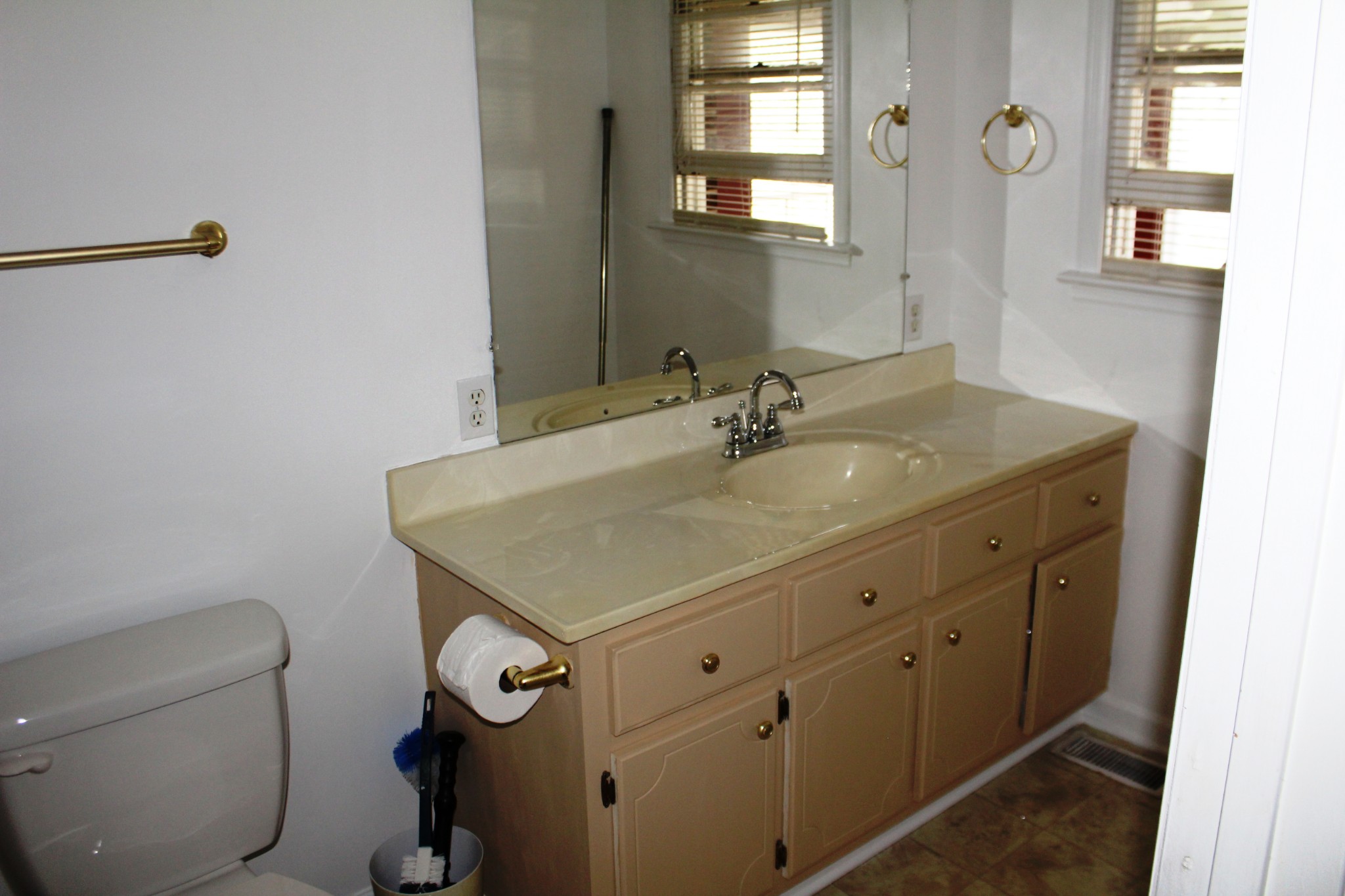 3847 Shellsford Road McMinnville, TN 37110 - Photo 18 of 34 a bathroom with a granite countertop toilet sink and mirror