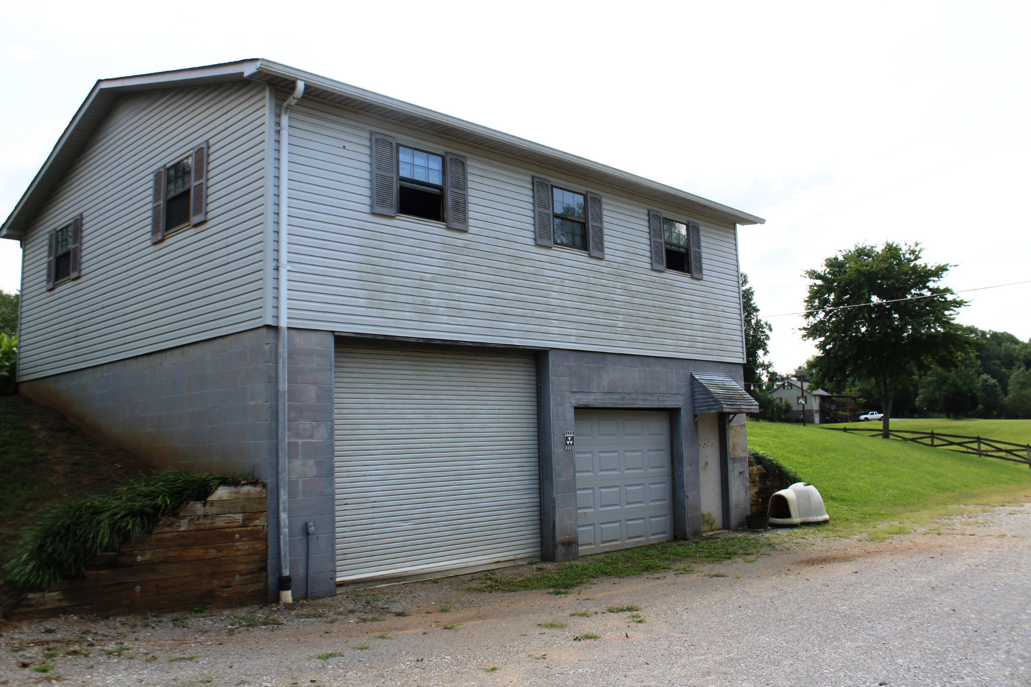 3847 Shellsford Road McMinnville, TN 37110 - Photo 24 of 34 a view of a house with backyard and garden