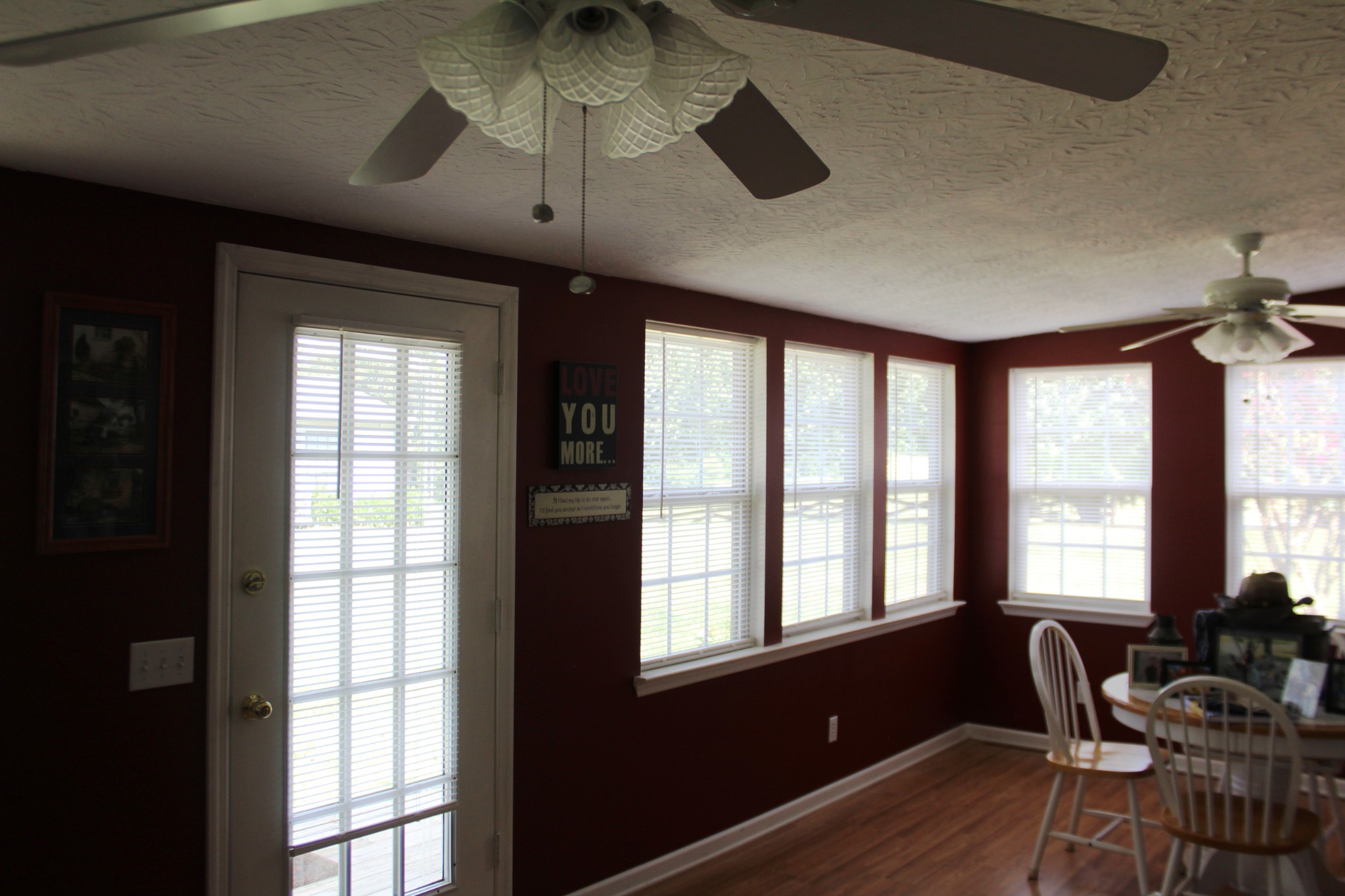 3847 Shellsford Road McMinnville, TN 37110 - Photo 6 of 34 a living room with furniture and floor to ceiling windows