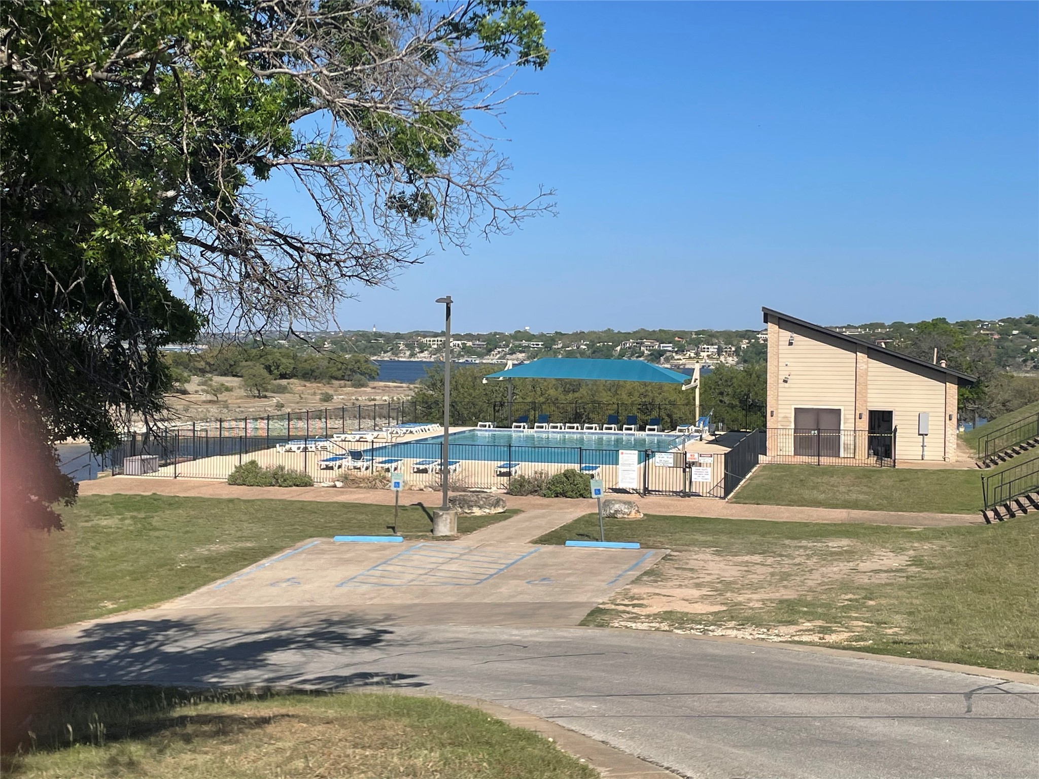301 Augusta Cove Lago Vista, TX 78645 - Photo 13 of 17 a view of a house with yard and lake view