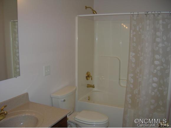 191 Big Cedar Drive Rutherfordton, NC 28139 - Photo 14 of 24 a bathroom with a toilet and shower