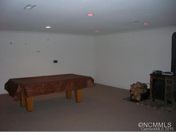 191 Big Cedar Drive Rutherfordton, NC 28139 - Photo 16 of 24 a room with a bed and a couch
