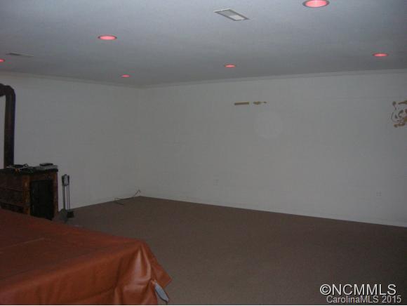 191 Big Cedar Drive Rutherfordton, NC 28139 - Photo 17 of 24 a room with a desk and chair
