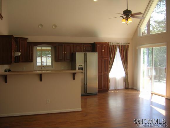 191 Big Cedar Drive Rutherfordton, NC 28139 - Photo 3 of 24 a view of a livingroom with a ceiling fan and window
