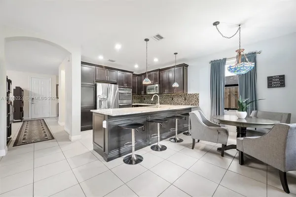 $889,000 | 8755 Northwest 102nd Court, Doral, FL 33178