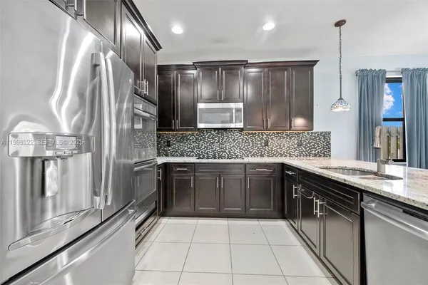 $889,000 | 8755 Northwest 102nd Court, Doral, FL 33178