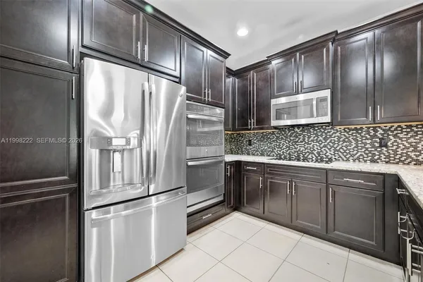 $889,000 | 8755 Northwest 102nd Court, Doral, FL 33178