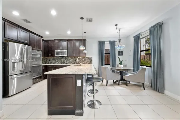 $889,000 | 8755 Northwest 102nd Court, Doral, FL 33178