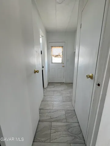 a view of a store room with shelves