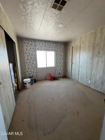 a view of a room with a fireplace