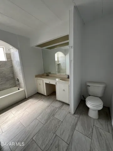 a view of a lake with a city