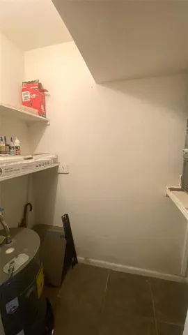 a room with furniture and cabinets