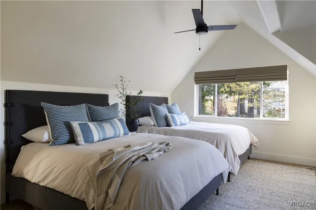 a bedroom with bed and window