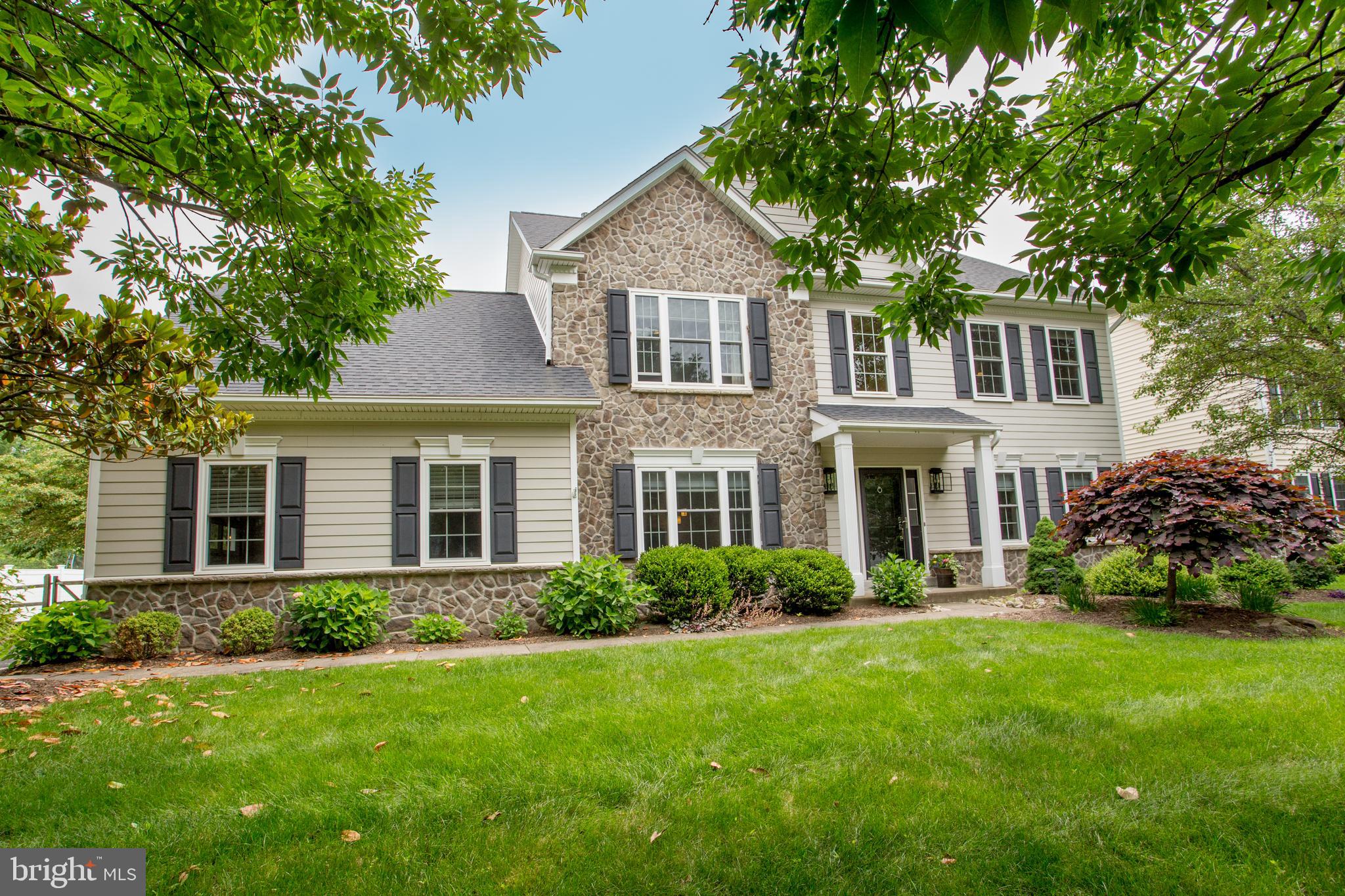 Hardie Plank and stone exterior