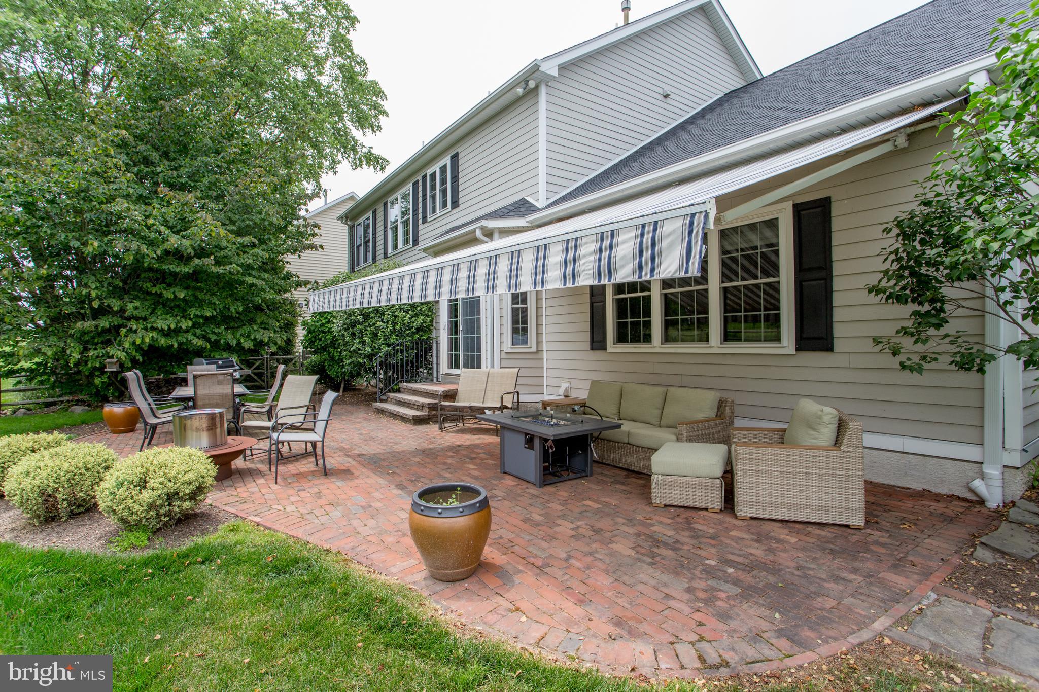 3879 Charter Club Drive Doylestown, PA 18902 - Photo 46 of 54 Brick patio with large awning over part for shade