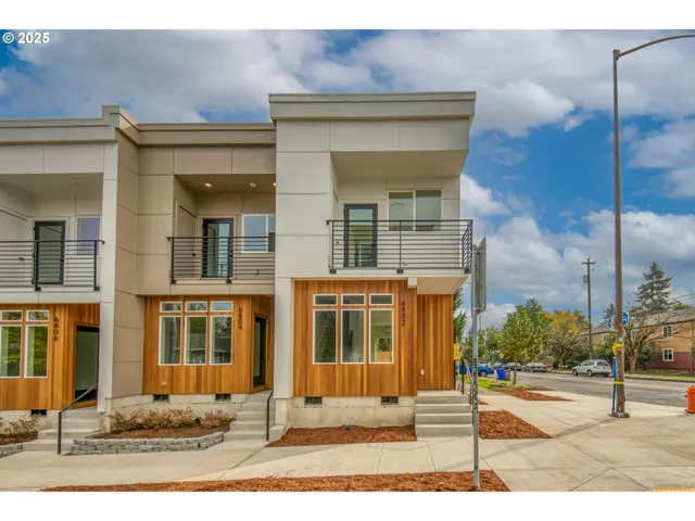 a front view of a building with street view