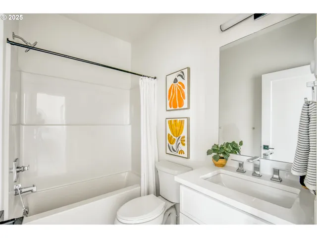 a bathroom with a sink a bathtub and a shower