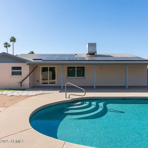 a view of a house with a swimming pool