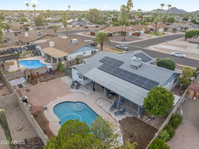 a kitchen with a sink cabinets and window