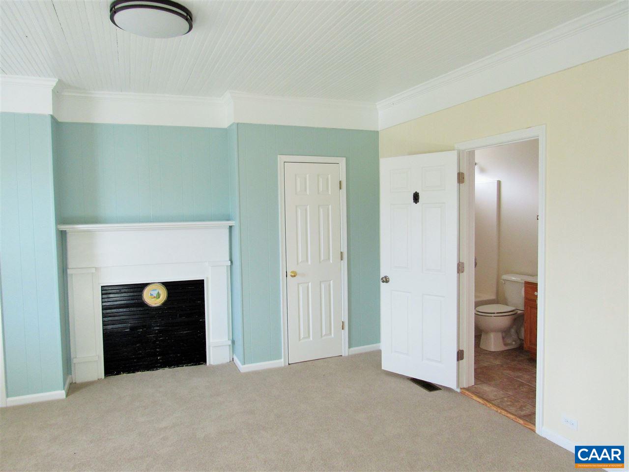188 Dyson Road Amherst, VA 24521 - Photo 8 of 43 a view of an empty room with fire place