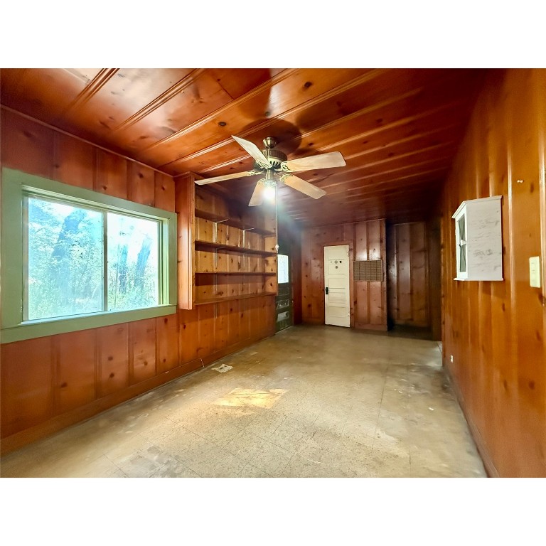 14456 Agarita Road Austin, TX 78734 - Photo 20 of 40 a room with furniture and a large window