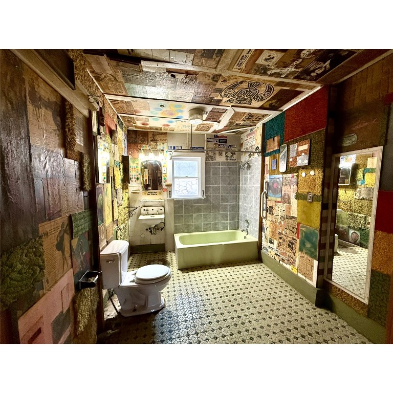 14456 Agarita Road Austin, TX 78734 - Photo 23 of 40 a bathroom with a sink and a shower