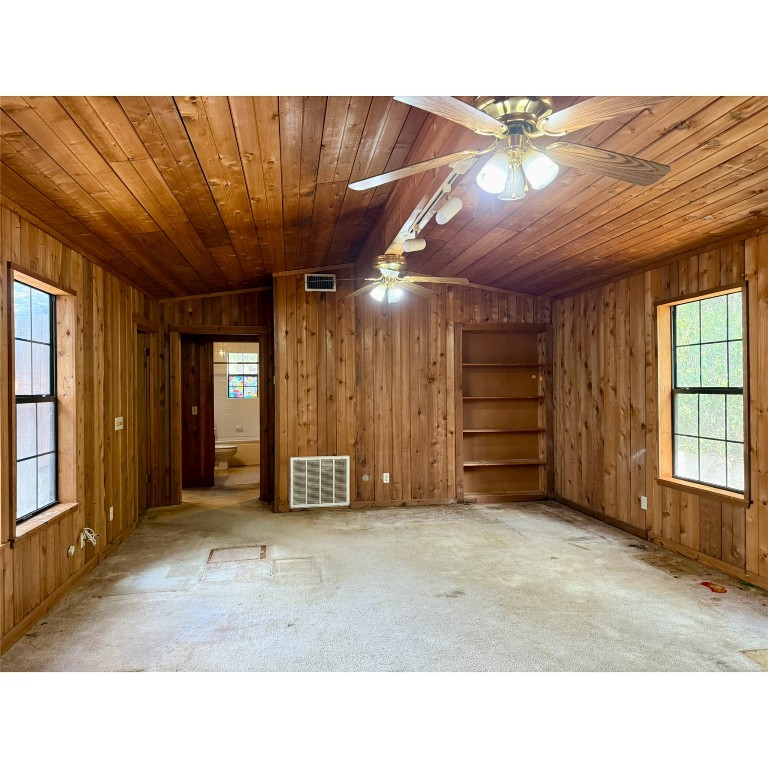 14456 Agarita Road Austin, TX 78734 - Photo 35 of 40 a room with furniture and window