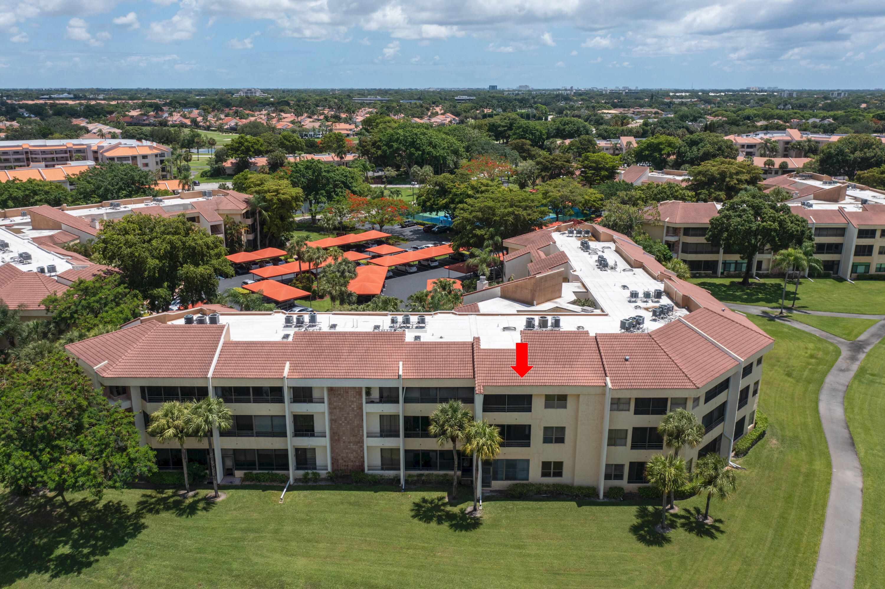 7520 La Paz Boulevard, Unit 104 Boca Raton, FL 33433 - Photo 3 of 56 an aerial view of a house