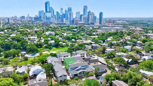 a view of a city with tall buildings