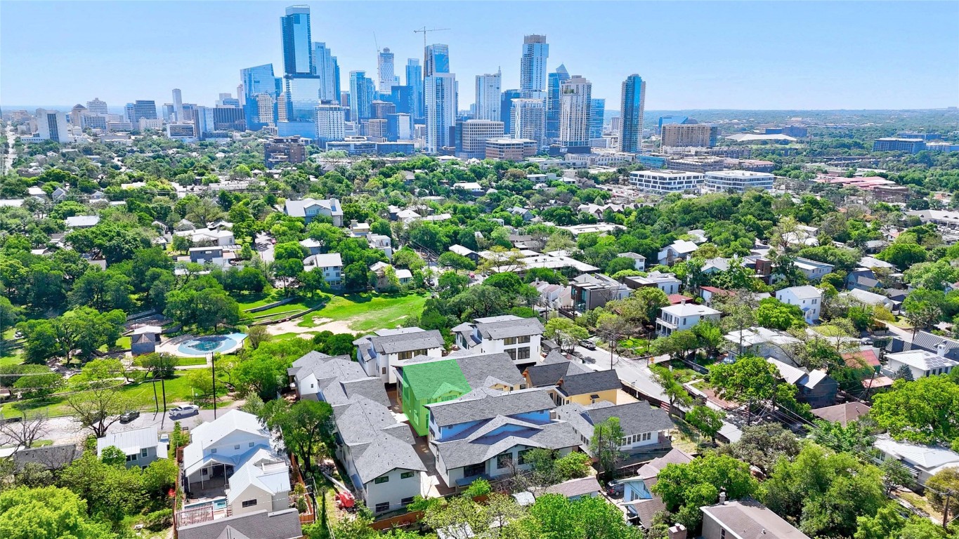a view of a city with tall buildings
