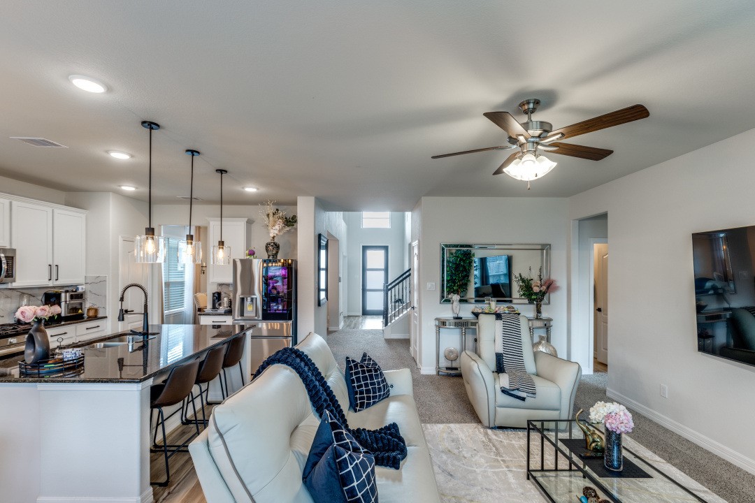 8327 Calico Pennant Way Fulshear, TX 77441 - Photo 12 of 44 a view of a livingroom with furniture and a large window