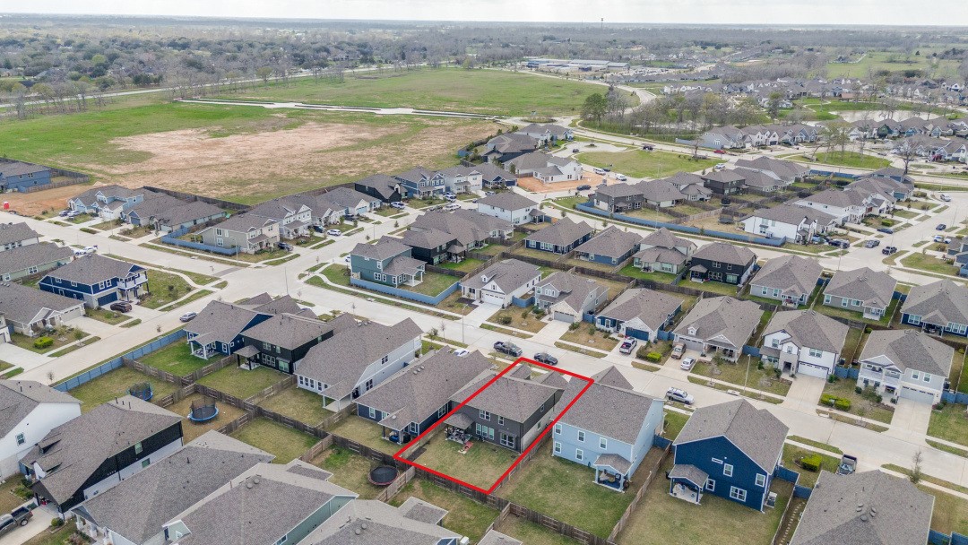 8327 Calico Pennant Way Fulshear, TX 77441 - Photo 43 of 44 an aerial view of a city with ocean view