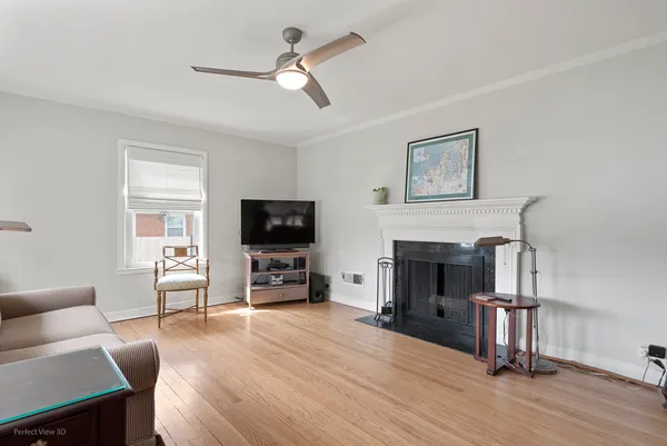 a living room with furniture fireplace and flat screen tv