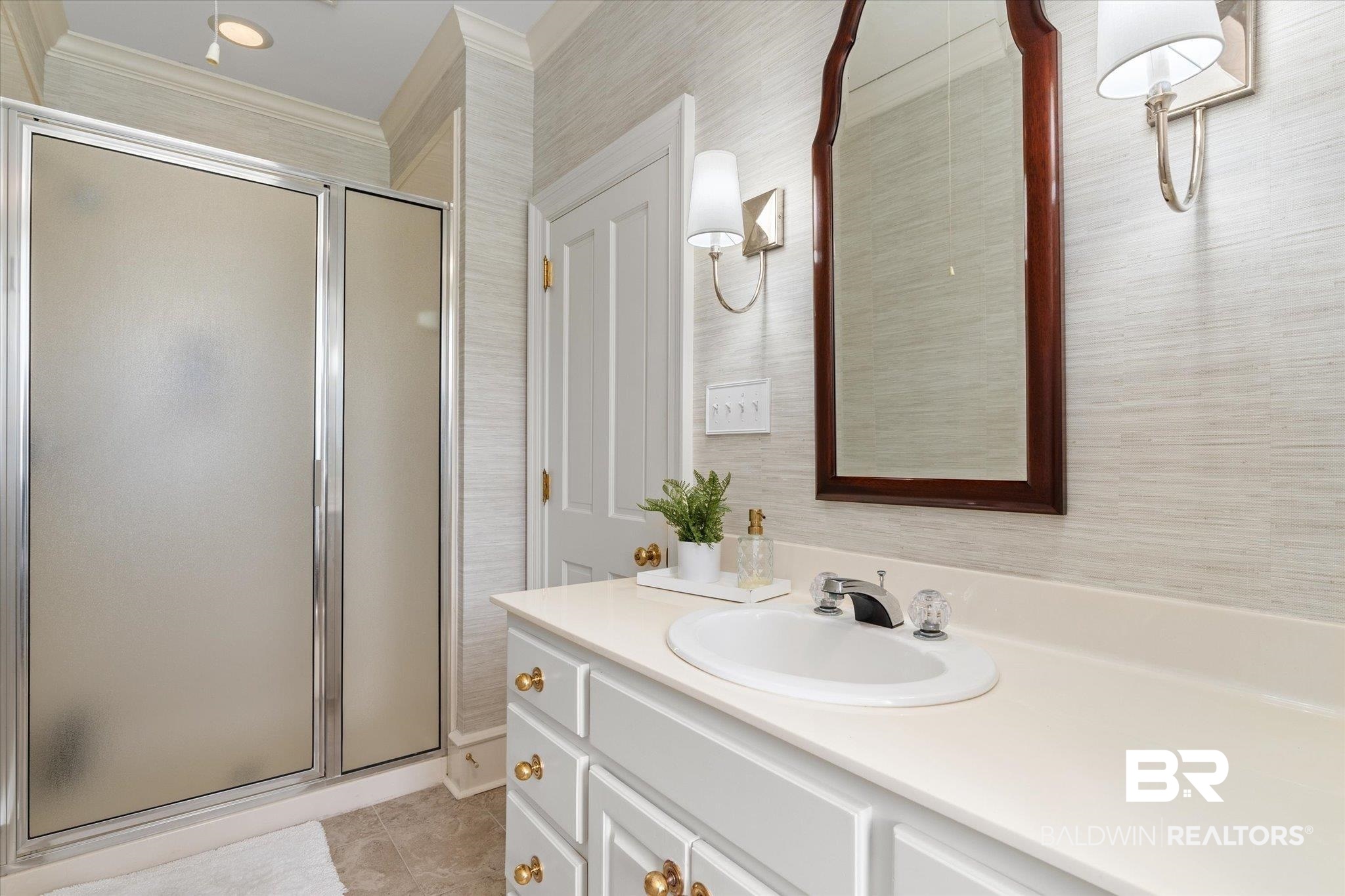 8561 Dawes Lake Road Mobile, AL 36619 - Photo 37 of 63 Full bathroom with vanity, a shower stall, tile patterned floors, and crown molding