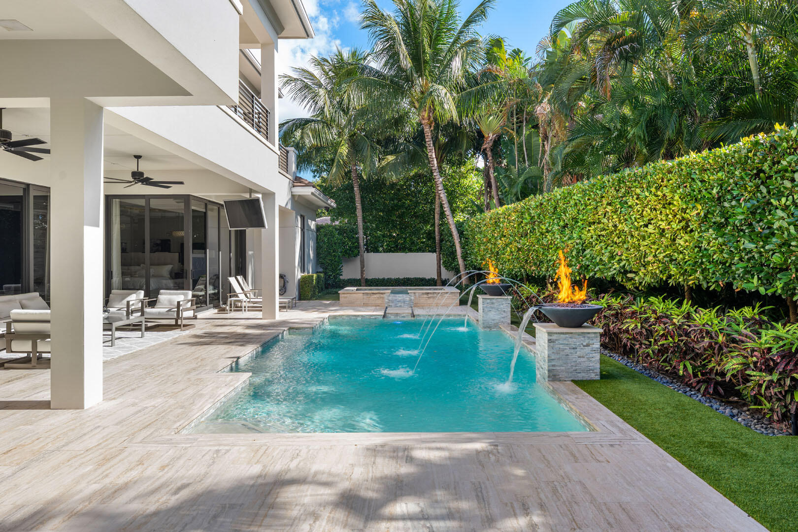 252 South Silver Palm Road Boca Raton, FL 33432 - Photo 30 of 90 a view of a house with backyard porch and sitting area